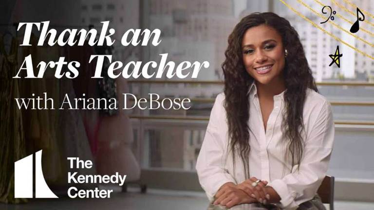 Ariana DeBose smiles at the camera next to Thank an Arts Teacher title