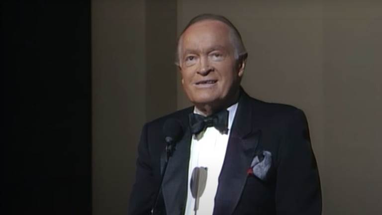 Bob Hope in a tuxedo paying tribute to George Burns at the Kennedy Center Honors
